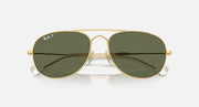 Gold aviator sunglasses with dark green lenses and slim gold metal frame