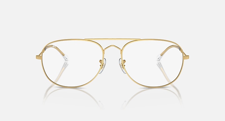 Gold aviator sunglasses with clear lenses and wireframe bridge