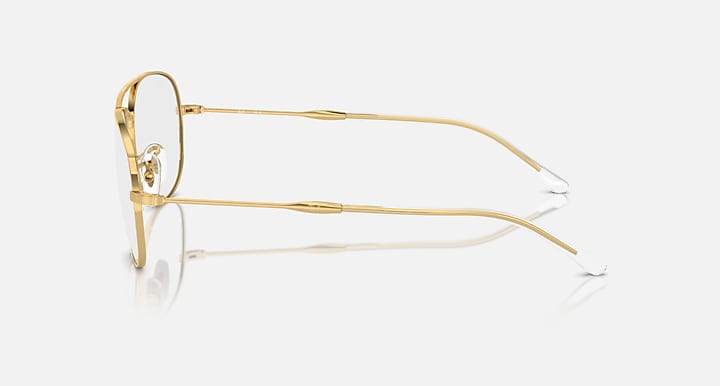 Gold aviator sunglasses side view with clear lenses and transparent temple tips