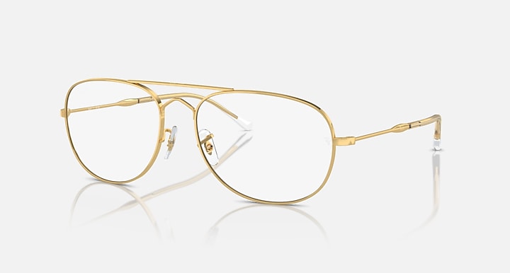 Gold aviator sunglasses with clear lenses and thin metal bridge