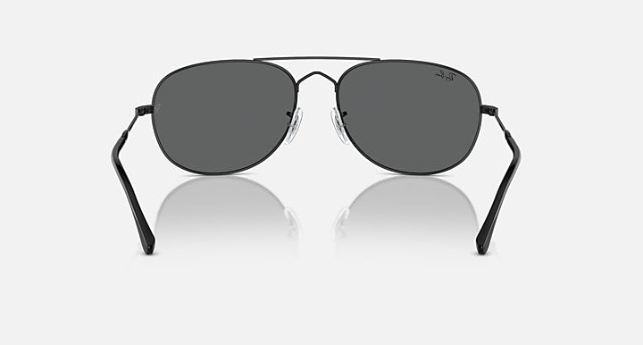 Ray-Ban metal sunglasses with dark gray lenses and curved black end pieces, front
