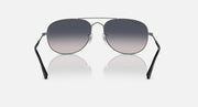 Ray-Ban aviator-style sunglasses with dark frame and smoky gradient lenses