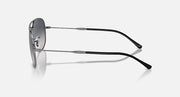 Ray-Ban aviator-style sunglasses side view with silver frame and dark lenses