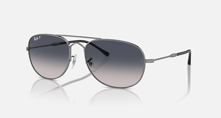 Ray-Ban aviator-style sunglasses with silver frame and dark smoke gradient lenses