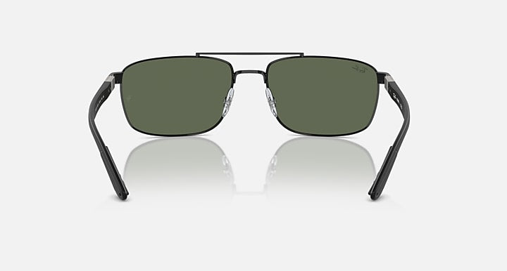 Sunglasses front view with dark green lenses and black frame