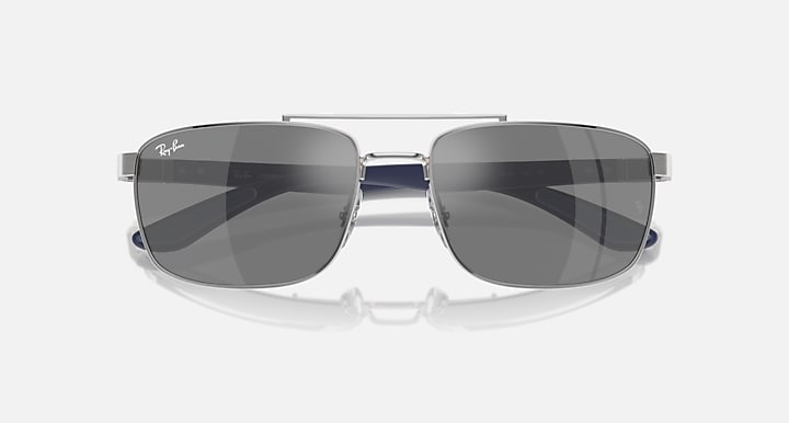Sunglasses top view with grey mirrored lenses and silver metal frame