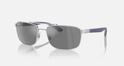 Sunglasses with grey mirrored lenses and silver frame with blue temple tips