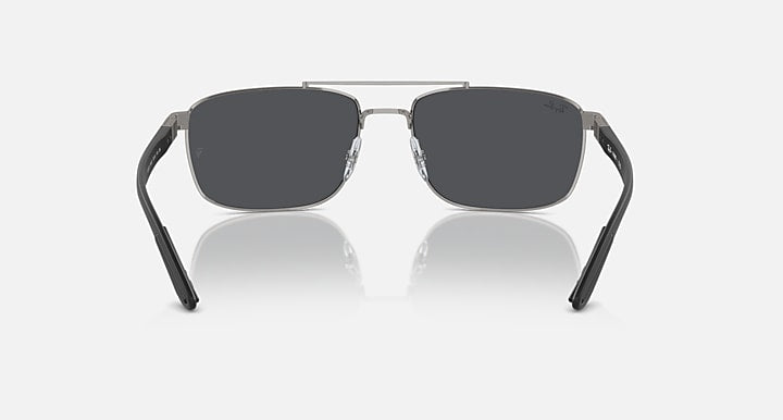 Rectangular metal sunglasses with dark lenses and silver bridge, front view