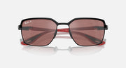 Close front view of square sunglasses with dark frames and rose mirrored lenses