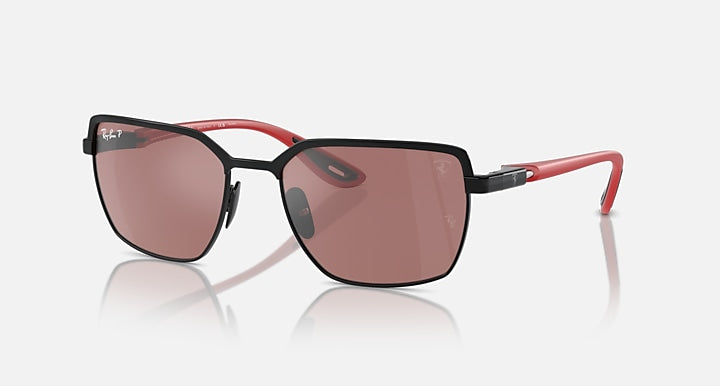 Square sunglasses with dark frames, rose mirrored lenses, and red temple accents
