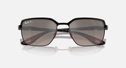 Close front view of square sunglasses with black frames and smoky mirrored lenses