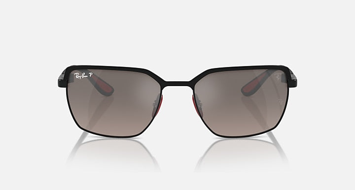 Front view of square sunglasses with black frames and dark tinted lenses
