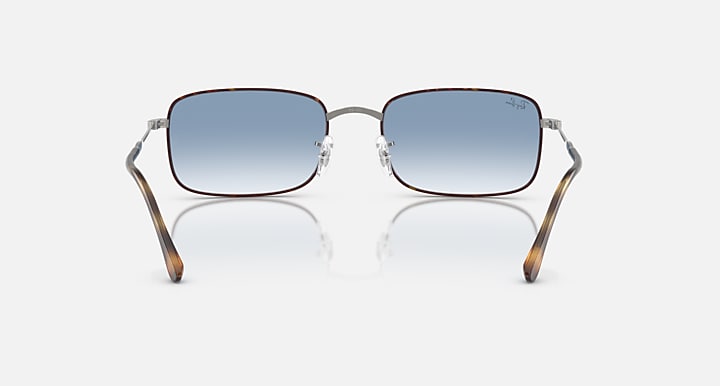 Front-view sunglasses with blue lenses, silver frame and tortoise brown arms