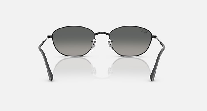 Sunglasses with dark gray lenses and black metal frames, front view.