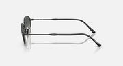 Sunglasses with dark gray lenses and black metal frames, side view.