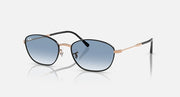 Sunglasses with blue tinted lenses and rose-gold/black metal frames, oval.