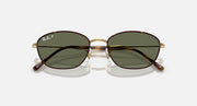 Ray-Ban sunglasses with dark green lenses and tortoise temple accents