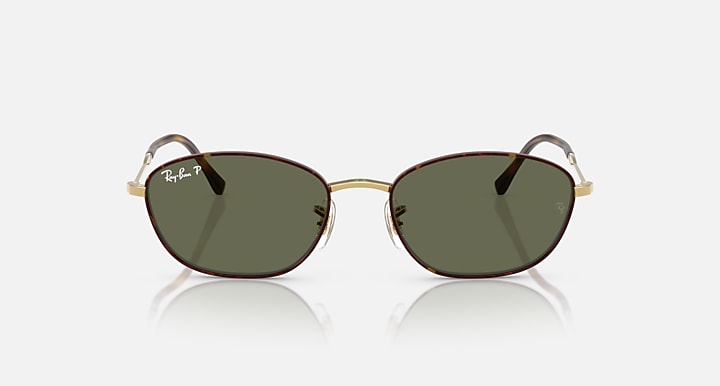 Ray-Ban oval sunglasses with gold frame and dark green lenses