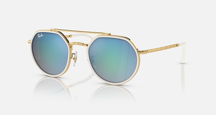 Ray-Ban round sunglasses with gold frame and teal gradient lenses