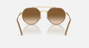 Ray-Ban round sunglasses front view, gold frame with medium brown lenses