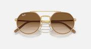Ray-Ban round sunglasses front view, gold frame with dark brown mirrored lenses