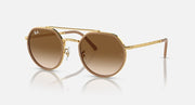 Ray-Ban round sunglasses with gold frame and brown gradient lenses
