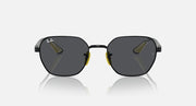 Black rounded sunglasses with dark grey tinted lenses, small yellow accents at hinges