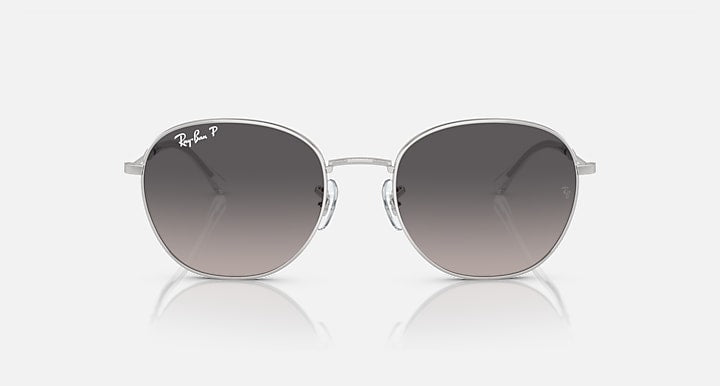 Ray-Ban RB3809 round sunglasses with clear silver frame and smoky gray gradient lenses