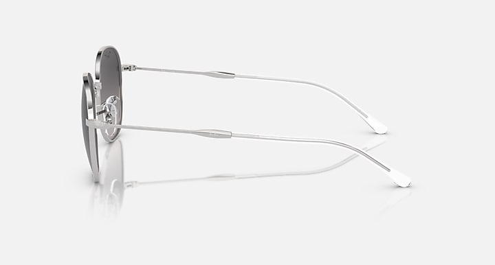 Ray-Ban RB3809 round sunglasses side view with clear silver frame and gray gradient lens