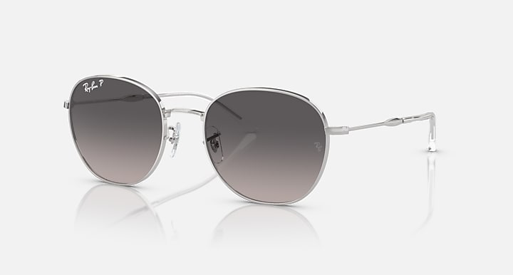 Ray-Ban RB3809 round sunglasses with clear silver frame and dark gray-to-brown lenses
