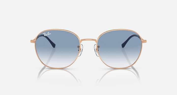 Round sunglasses with rose-gold metal frame and blue tinted lenses.