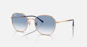 Round sunglasses with rose-gold metal frame and light-to-dark blue tinted lenses.