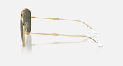 Aviator sunglasses with gold frame, olive green lens, and clear tips on temples