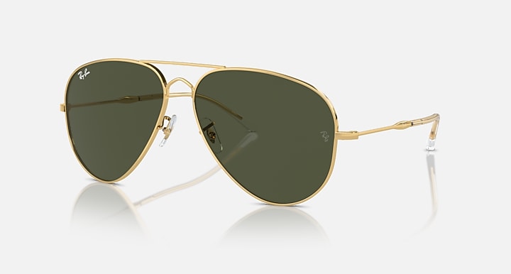Aviator sunglasses with gold frame and olive green lenses, metal bridge and temples