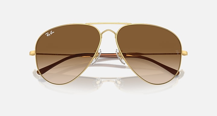 Ray-Ban Old Aviator sunglasses, gold frame with brown gradient lenses, top-down view