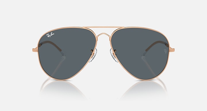 Aviator sunglasses with gold frame and dark gray mirrored lenses, front view