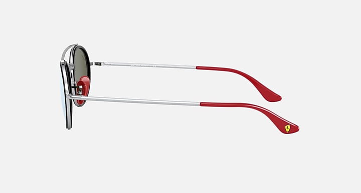 Ray-Ban RB3847M sunglasses side view with dark tinted lens, silver frame and red temple tips