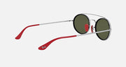 Ray-Ban RB3847M sunglasses angled view with green tinted lenses and red temple arms