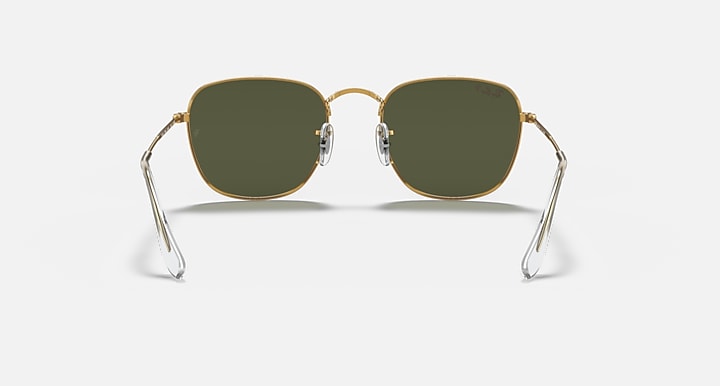 Ray-Ban Frank RB3857 sunglasses front view with gold frame and dark olive-green lenses