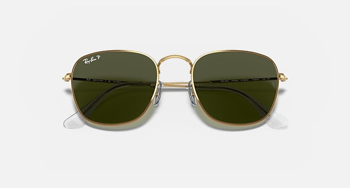 Ray-Ban Frank RB3857 sunglasses close front view with gold frame and dark olive-green lenses
