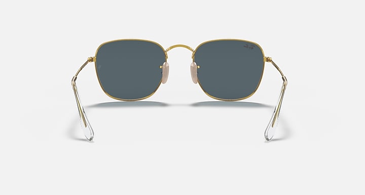 Ray-Ban Frank RB3857 sunglasses front view with gold frame and dark gray-blue round lenses
