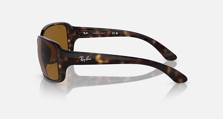 Havana tortoiseshell sunglasses with amber lenses, side profile and curved arms