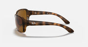 Side view of square sunglasses with brown lens and light Havana clear frame