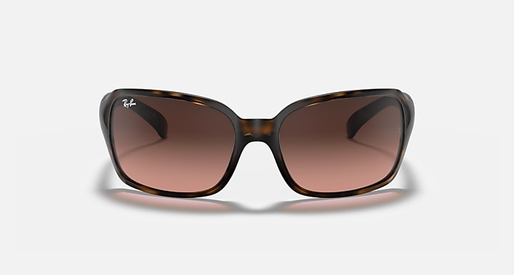 Havana tortoiseshell sunglasses with dark brown lenses, front view square frames