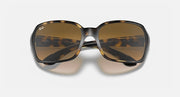 Front view of square sunglasses with dark brown tinted lenses and light Havana clear frame