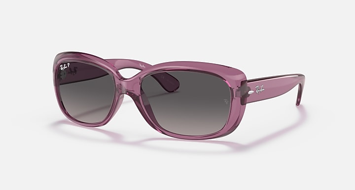 Ray-Ban Jackie Ohh RB4101 sunglasses with violet translucent frames and dark gradient lenses