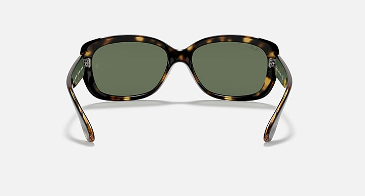 Tortoise-style sunglasses with dark green lenses, front view with metal-like hinges