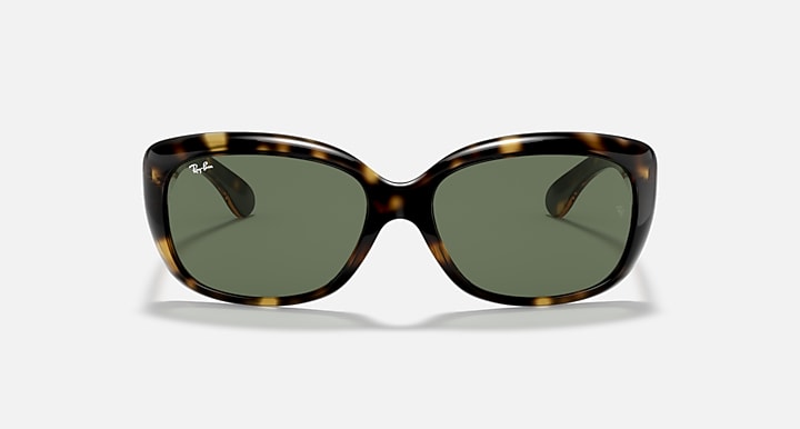 Tortoise-style oval sunglasses with dark green lenses, centered front view