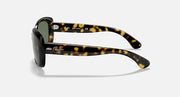 Tortoise-style sunglasses with dark green lenses, side profile with curved arms