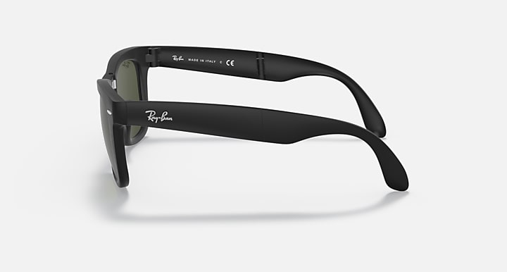 Ray-Ban Folding Wayfarer sunglasses side view with dark frame and green tinted lenses